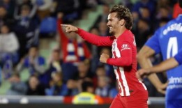 格列兹曼的帽子戏法锁定了马竞的胜利和欧冠席位